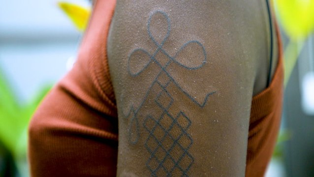 Meet the tattoo artist breaking race and gender barriers