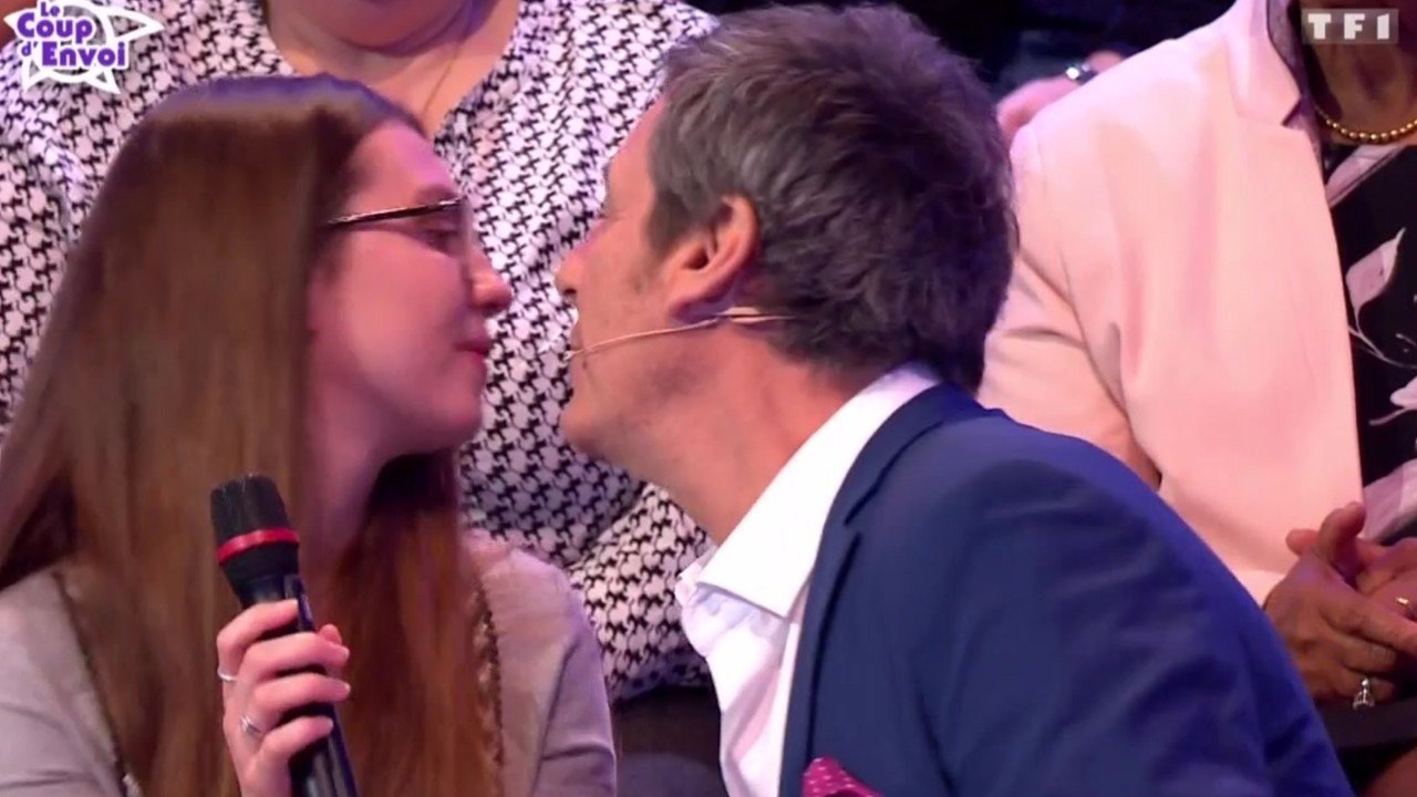 FEMME ACTUELLE -  Oups ! Jean-Luc Reichmann embrasse (presque) sur la bouche la compagne d'un candidat très jaloux