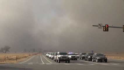 Evacuating as smoke envelopes everything