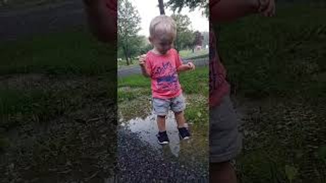 Perfect Puddle Soaks Playful Kid