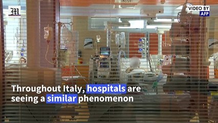Italian hospitals under strain as Covid hits new highs