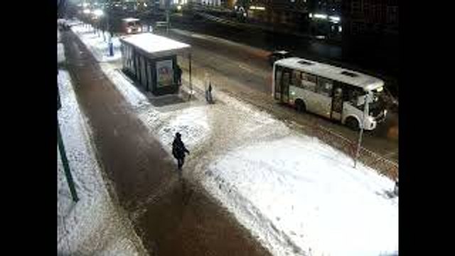 Bus Nearly Runs Over Pedestrians Due to Icy Roads