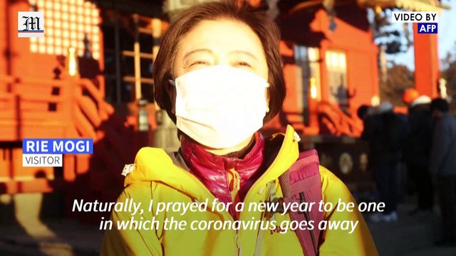 Worshippers pray for a good year at mountain-top Tokyo shrine