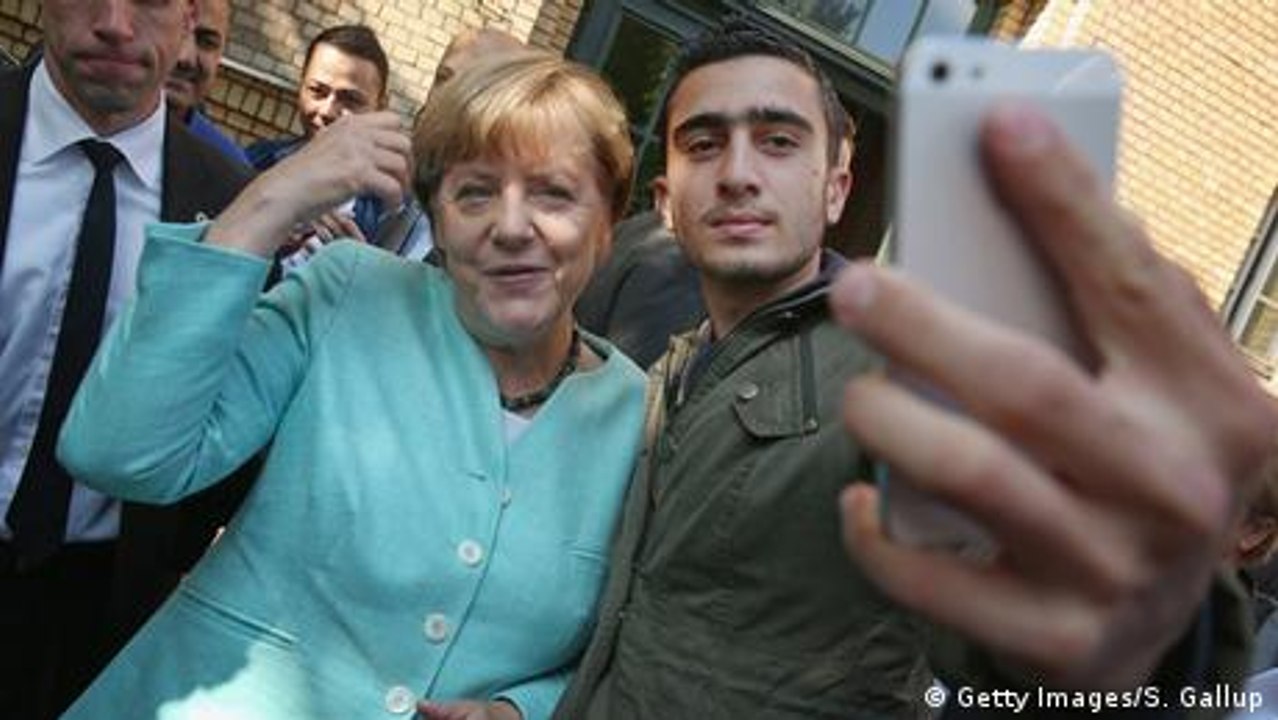 Ein Selfie mit Merkel ändert das Leben eines Flüchtlings