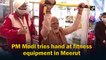 Watch: PM Modi tries hand at fitness equipment in Meerut