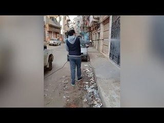 بعد تعدد الإصابات.. أهالي منية دمياط يطهرون القرية ضد فيروس كورونا