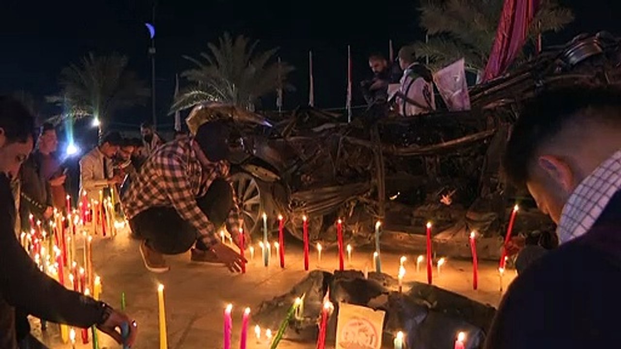 إضاءة شموع في مطار بغداد في الذكرى الثانية لاغتيال سليماني والمهندس