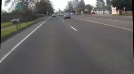 Car Cuts Off Motorcyclist