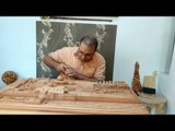 النحت على الخشب.. بليغ يصمم مجسم المسجد الأقصى في عام ونصف