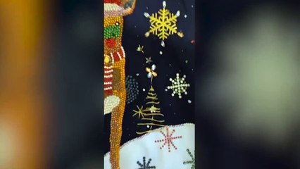 BIT DEER - An artist is selling the world's most expensive Christmas jumper - a £30k diamond encrusted festive number - which took him over six months to make