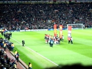 Entrée sur la pelouse d'Old Trafford