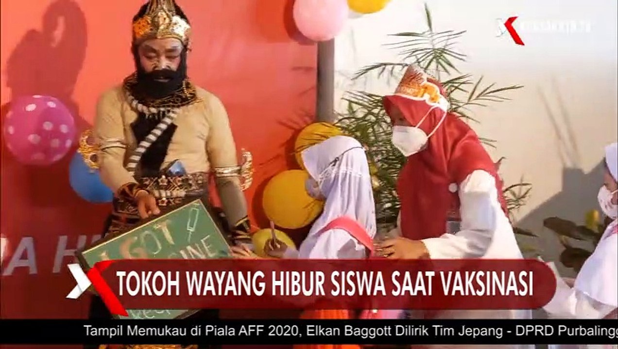 Guru Jadi Tokoh Wayang, Hibur Siswa Saat Vaksinasi di Nasima Semarang