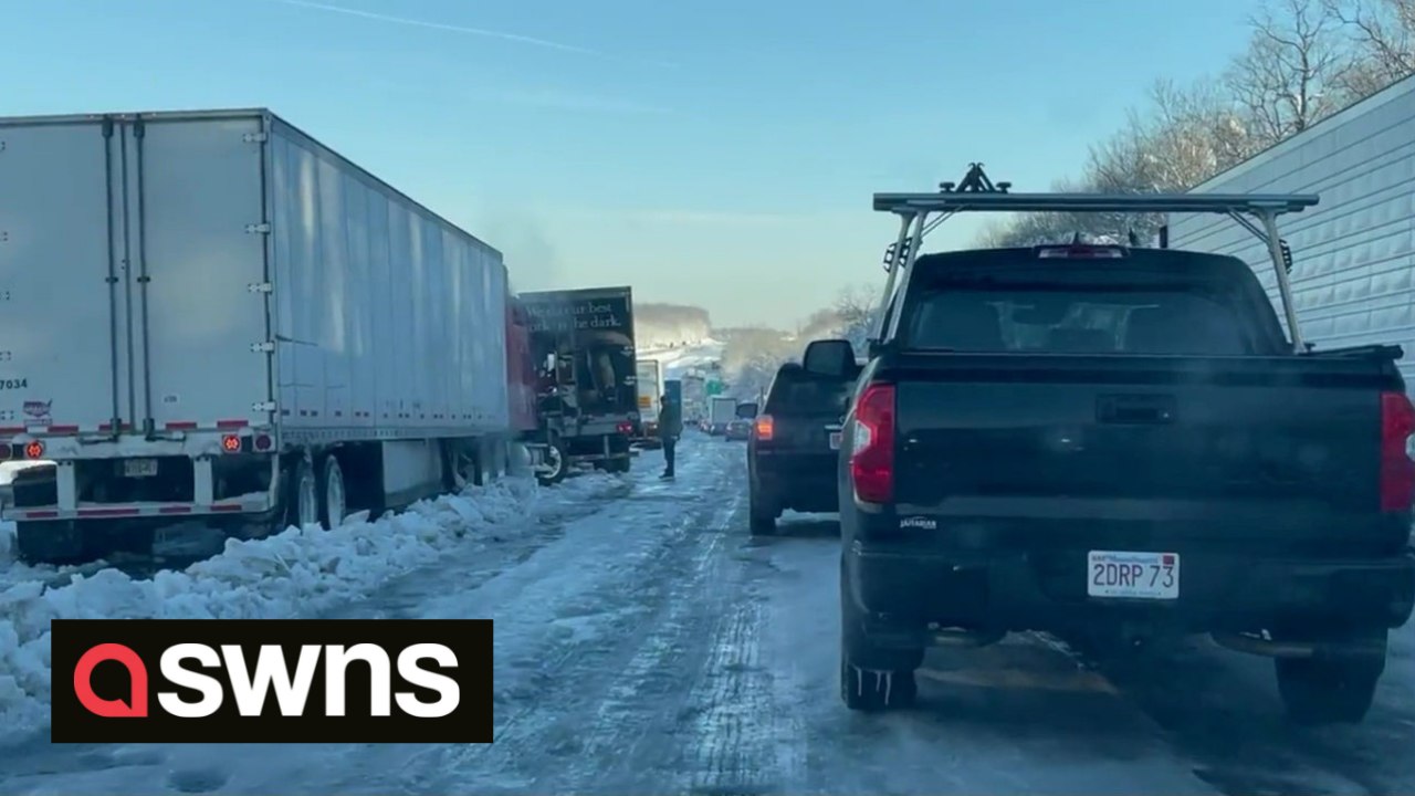 Moment motorist in Virginia is freed after being stranded on I-95 for THIRTEEN HOURS