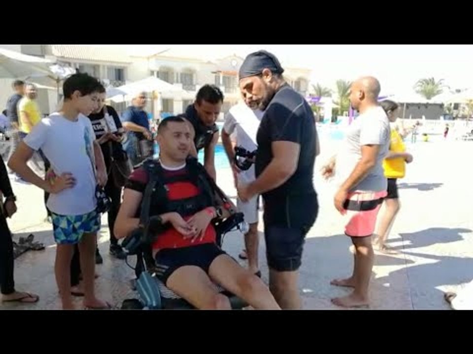 الربان ولاء حافظ أول مصاب شلل رباعي يحاول دخول موسوعة جينيس بأطول غطسة