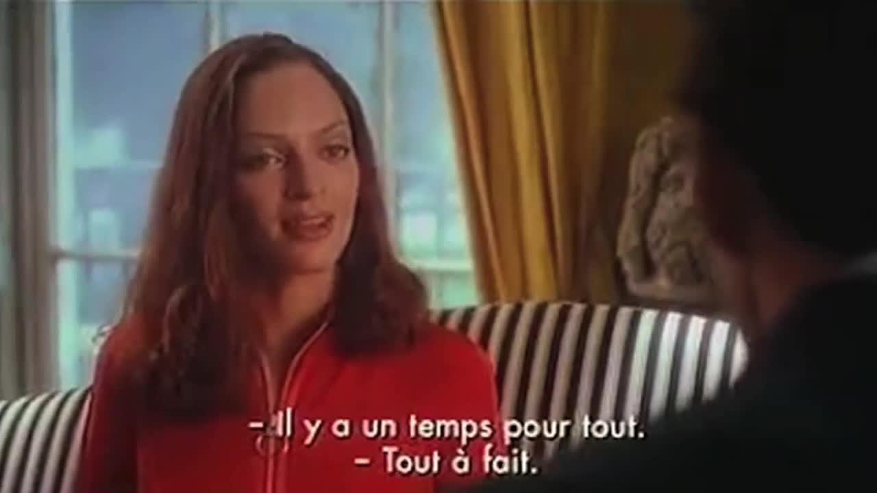 Chapeau melon et bottes de cuir