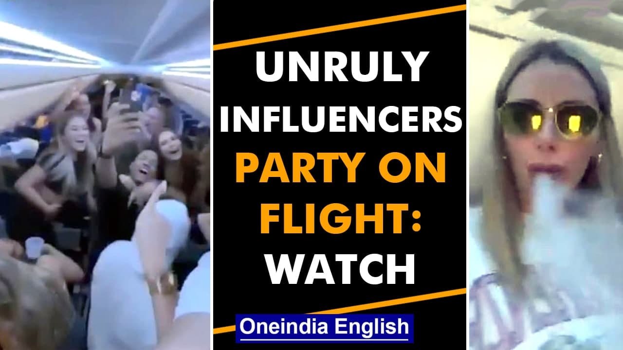 Influencers party on flight without mask, airline abandons them: Watch | Oneindia News