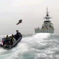 British Royal Marines explore storming a ship at sea with jet packs