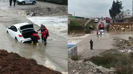 Download Video: Aracını kurtarmak isterken akıntıya kapılan sürücü ölümden döndü