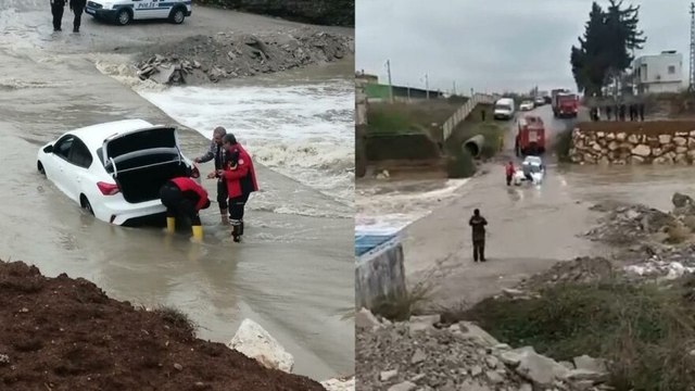 Aracını kurtarmak isterken akıntıya kapılan sürücü ölümden döndü