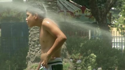 Скачать видео: Una histórica ola de calor, con temperaturas de más de 45 grados, azota Argentina