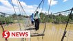 Rickety suspension bridge in Sandakan village temporarily closed