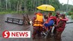 Flash floods hit three houses in Sibu village