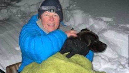 Dog rescued after surviving in deep snow, wildfire