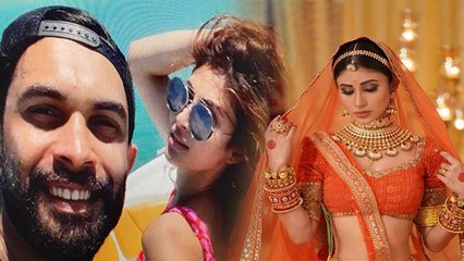 Télécharger la video: Mouni Roy की Wedding Date कन्फर्म , फिआंसे Suraj Nambiar कौन है ? | Boldsky