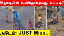 Mangaluru man speeding on scooter escapes collision as bus takes turn | Oneindia Tamil