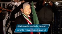 Desean pronta recuperación a AMLO con mariachi en Palacio Nacional