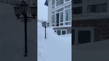 Man Leaps Into Giant Snow Pile