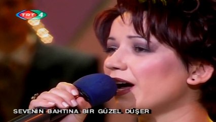 Ebru Özçengel / Değdi saçlarıma bahar gülleri