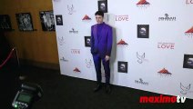 Tom Lewis attends the ‘Redeeming Love’ film premiere red carpet in Los Angeles