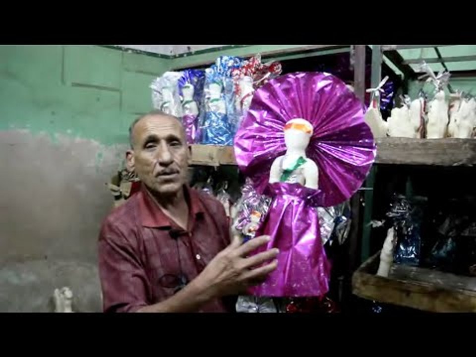 «عروسة المولد والحصان» تتصدر شوادر بيع حلوى الم...