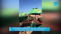 Helicóptero sobrevoló a metros de los turistas en Villa Gesell e hizo volar las sombrillas