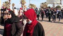 شاهد: مسيرة في غزة لتشجيع المرأة الفلسطينية على ممارسة الرياضة