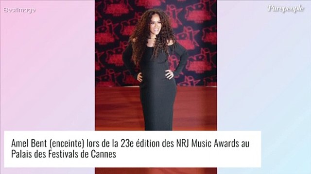 Amel Bent enceinte : son ventre rond tendrement embrassé par sa fille