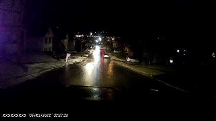 Close Call for Car on Icy Hill
