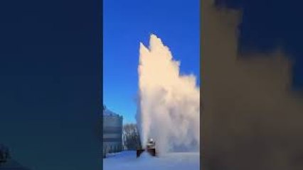 Old SnoGo Truck Launching Snow High into the Air
