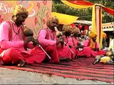 Decorated & well dressed in pink; Snake charmers performing in Dilli Haat