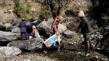 Kashmir: Remote villagers unite to clean up their stream