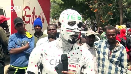 Young Man Paints Body As  A Voter Registration Campaign