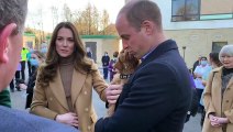 Prince William and Kate Middleton meet 'Alfie' the cockapoo puppy at Clitheroe Community Hospital