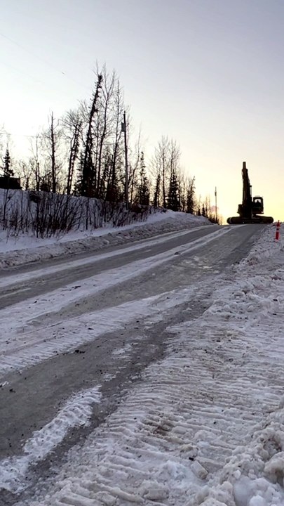 Sliding a Backhoe Down an Icy Road