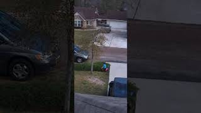 Security Camera Catches Child Wiping Out on Tricycle