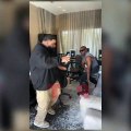 DJ Khaled and Kanye West dance in the studio