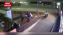 Man speeding on scooter escapes horrific collision with bus