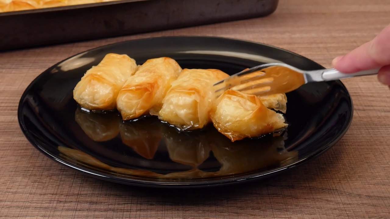 Hot and traditional rolls of Greek custard pie