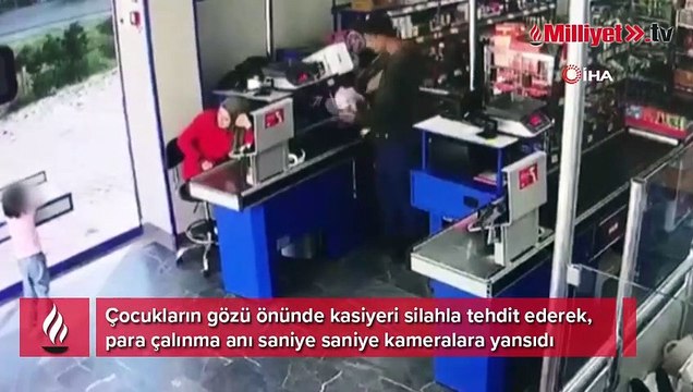 Çocukların gözü önünde marketteki silahlı soygun kamerada