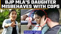 BJP MLA Aravind Limbavali's daughter misbehaves with traffic police, Watch | Oneindia News *news